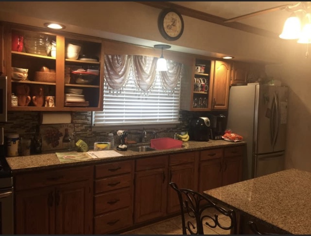 Finished kitchen cabinetry by JK We Love to Paint